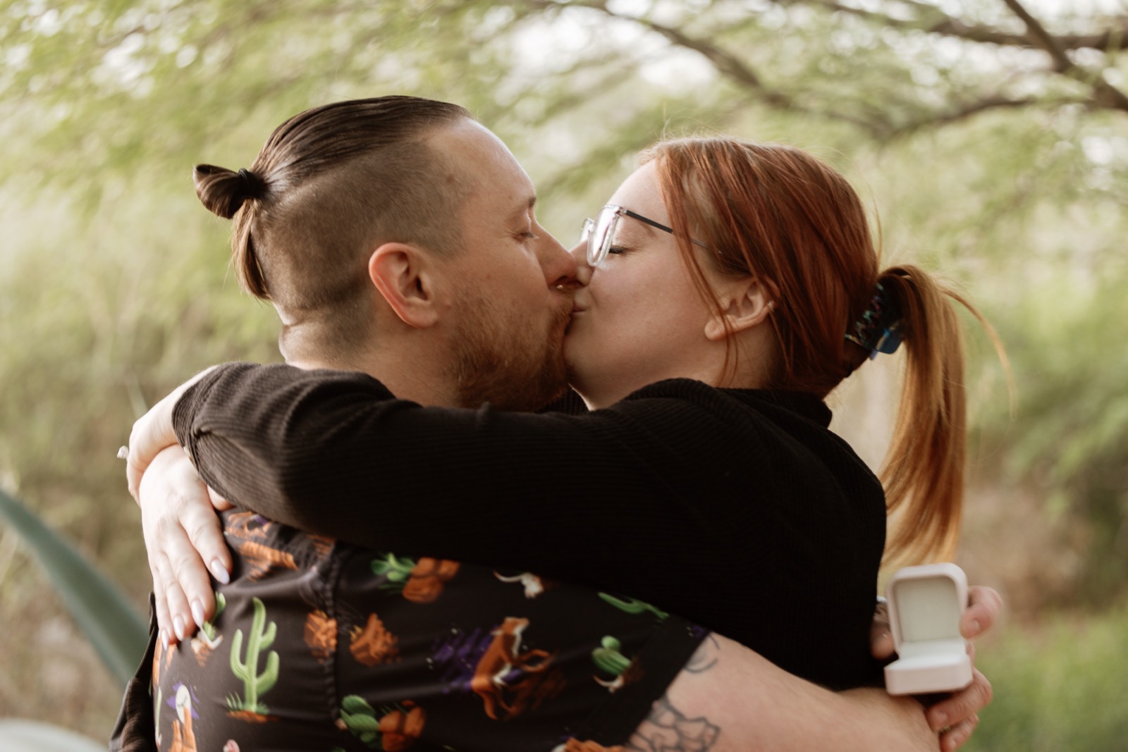 Engagement kiss with the ring